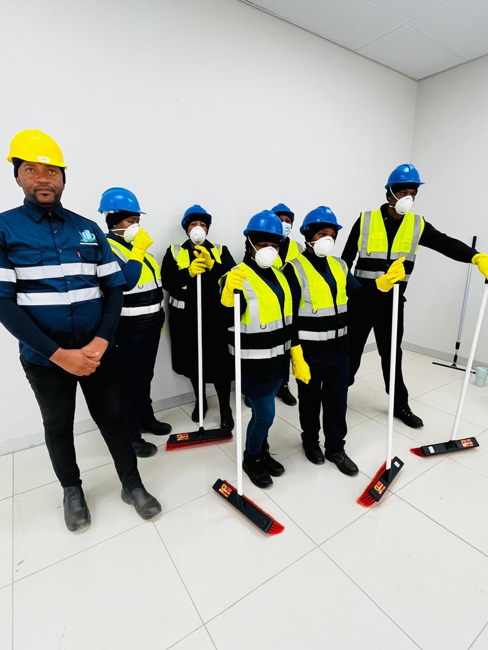 Trellis cleaning team in full PPE with equipment