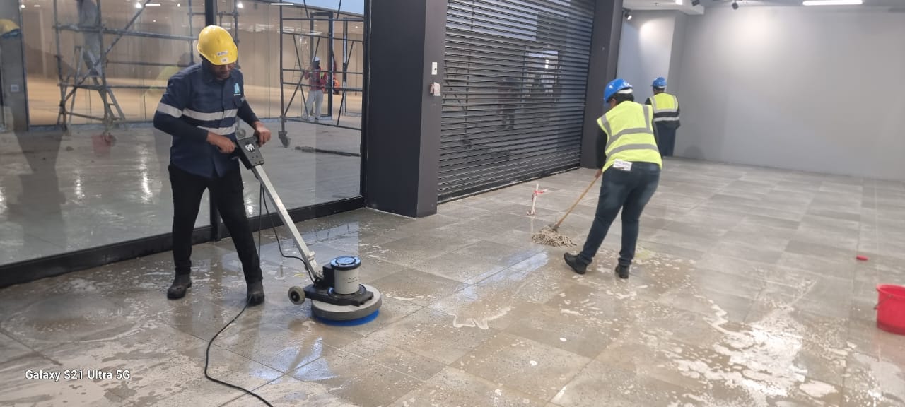 Trellis team scrubbing and polishing a retail floor